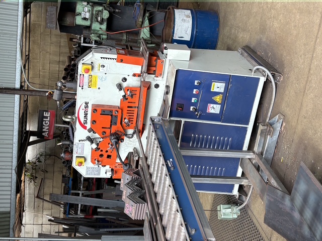 Sunrise ironworker machine in the workshop — set up for angle punching