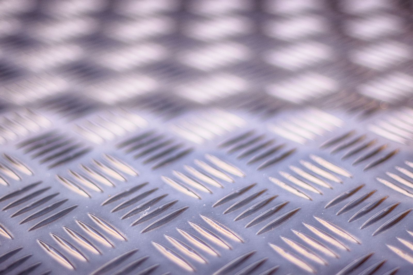 Checker plate (tread plate) surface detail — close-up