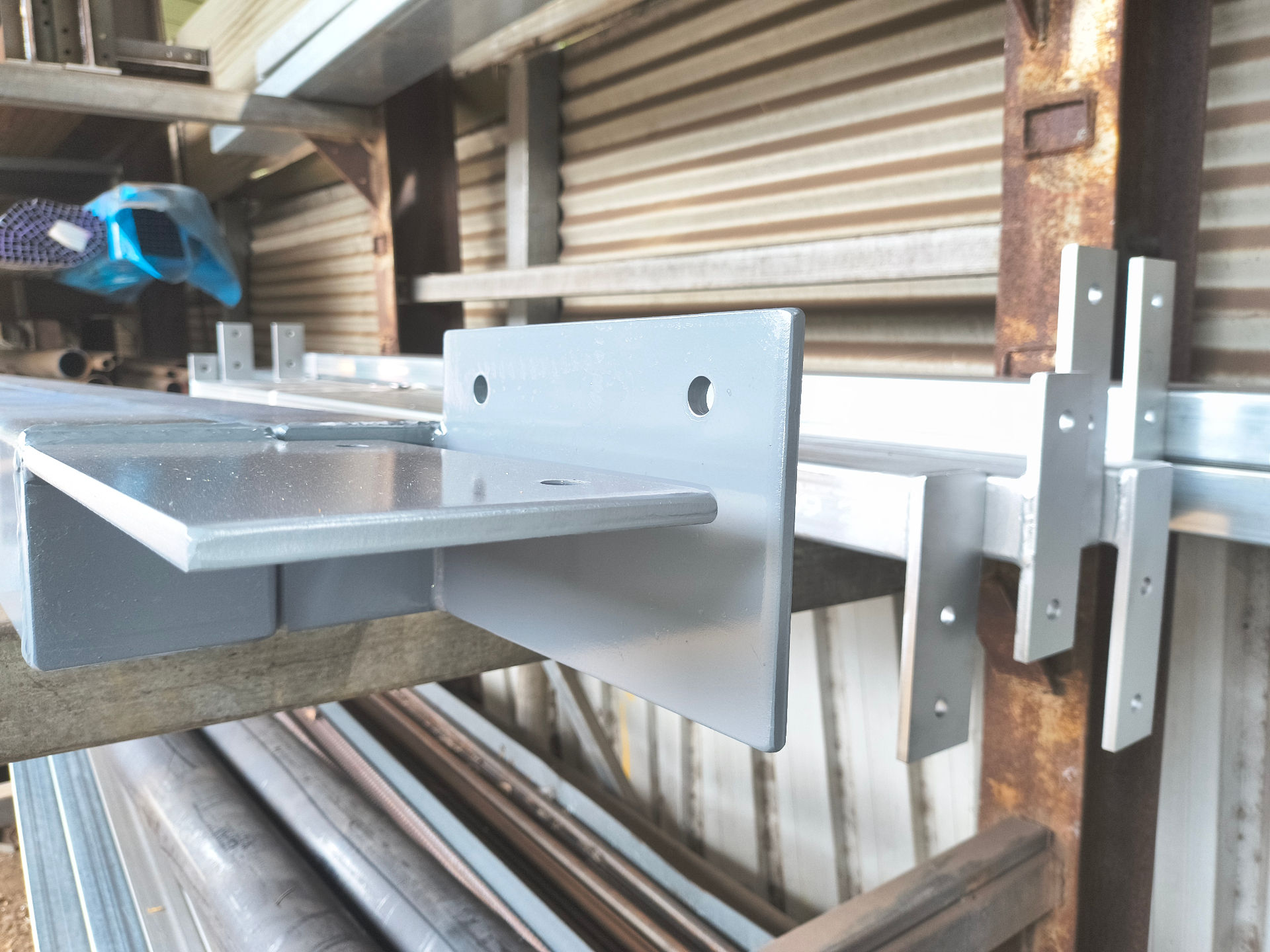 Custom-fabricated grey painted steel brackets at Marshall Steel Burleigh Heads