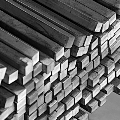Bundle of solid mild steel square bar, end-on view