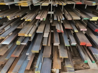 Black mild steel flat bar stack at Marshall Steel