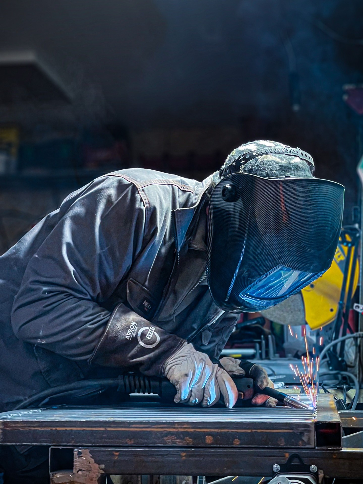 Marshall Steel welder running a MIG bead in the workshop