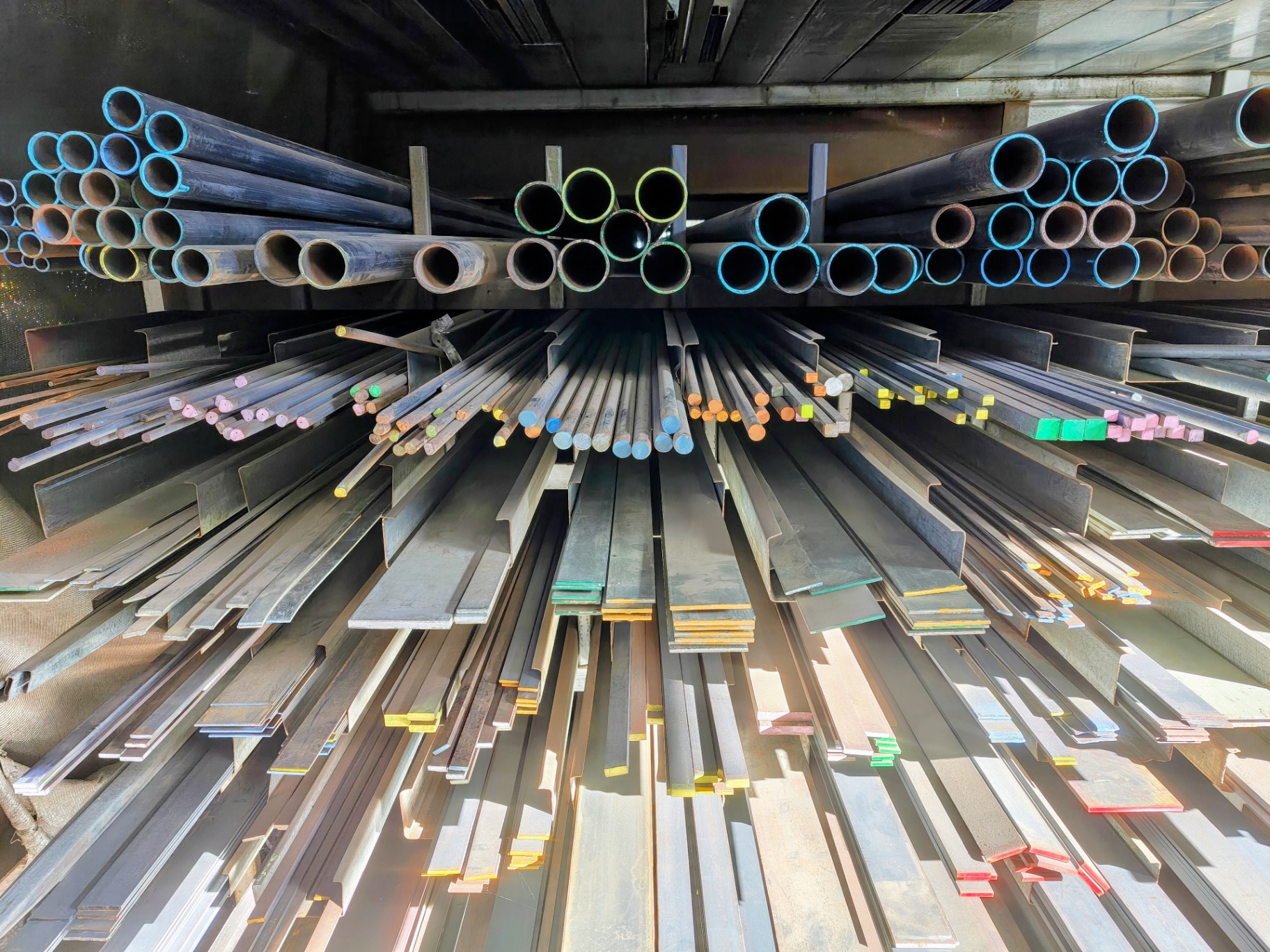 Mild steel bar stock in colour-coded sizes at Marshall Steel