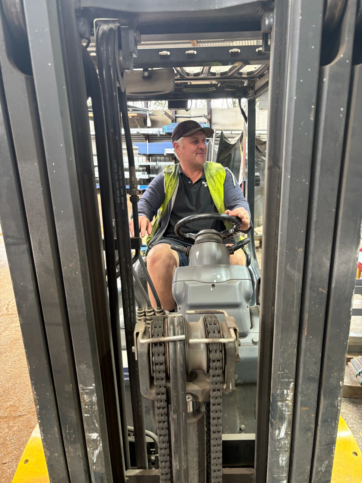 Peter, owner of Marshall Steel, on the forklift in the Burleigh Heads yard