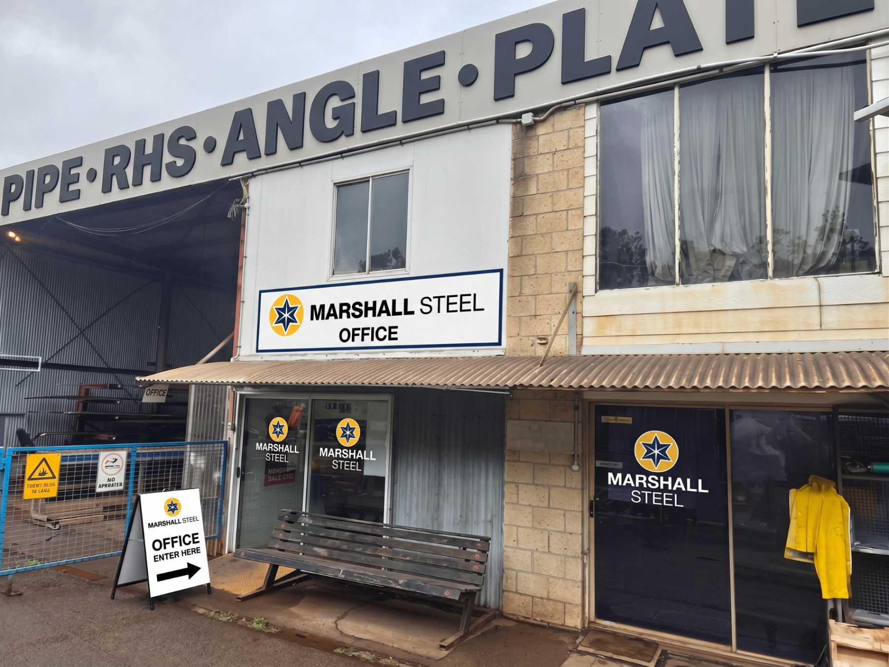 The Marshall Steel office shopfront at 9 Stevenson Court, Burleigh Heads — look for the navy and yellow sign